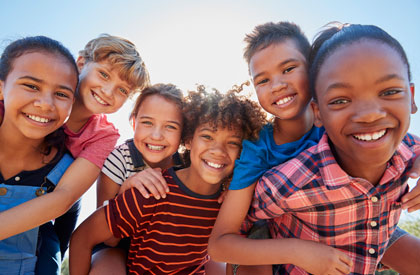 kids crowding around the camera