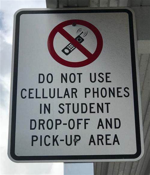 Photo of no cell phones sign