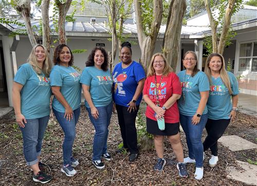 First Grade Teachers standing in the courtyard