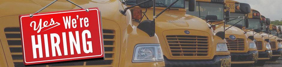 School bus with We're Hiring sign School bus with We're Hiring sign