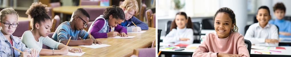 Students in a classroom taking a test.