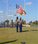 Color Guard holding flags on the field 