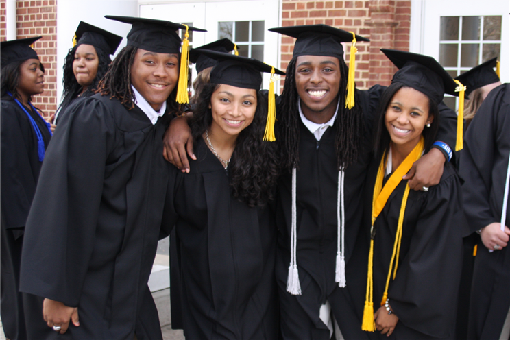 Graduates with graduation regalia