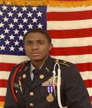 Battalion Executive Officer with American flag in the background 