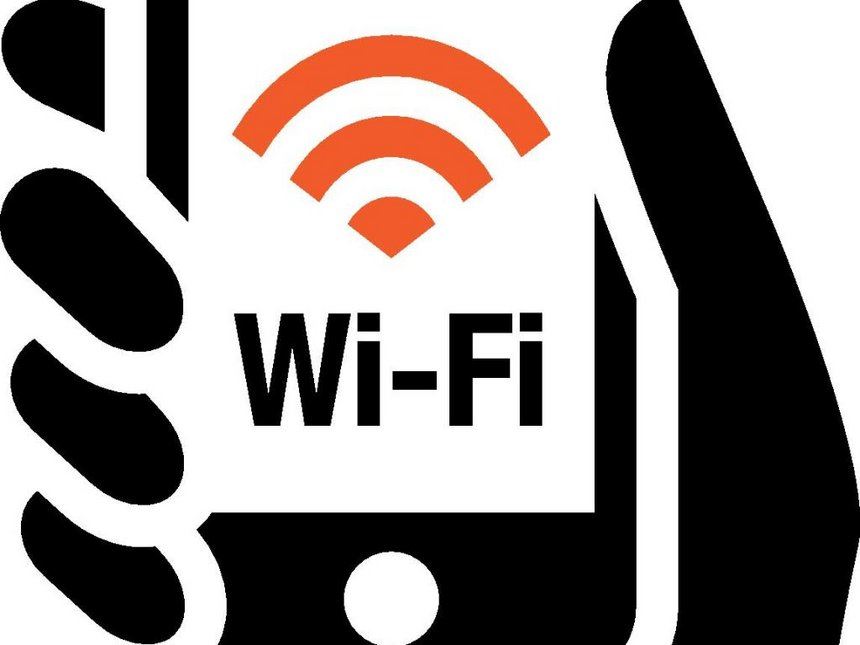  WiFi symbol on mobile device held in hand