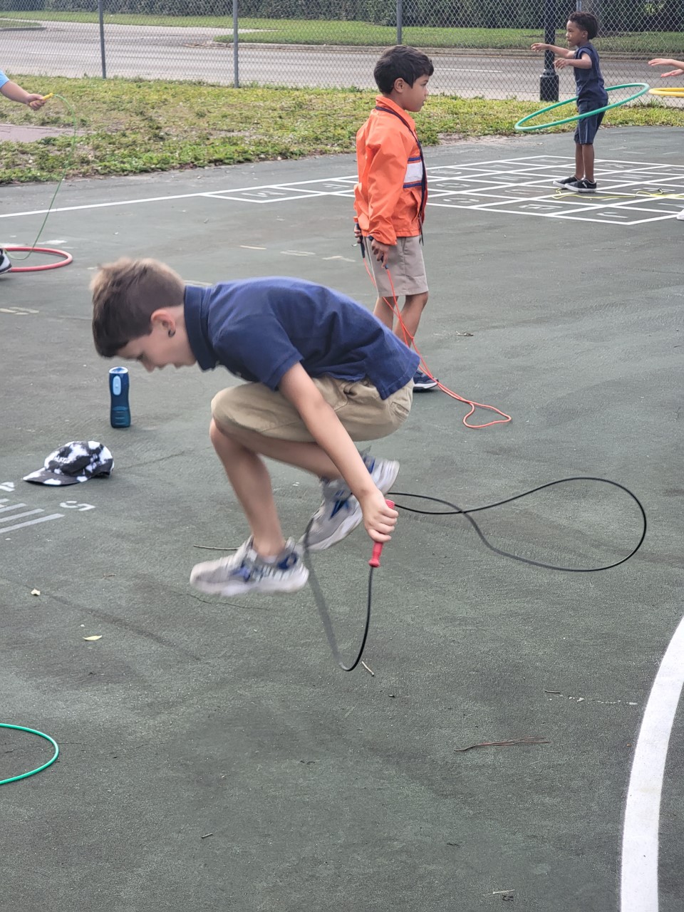 student jumping rope