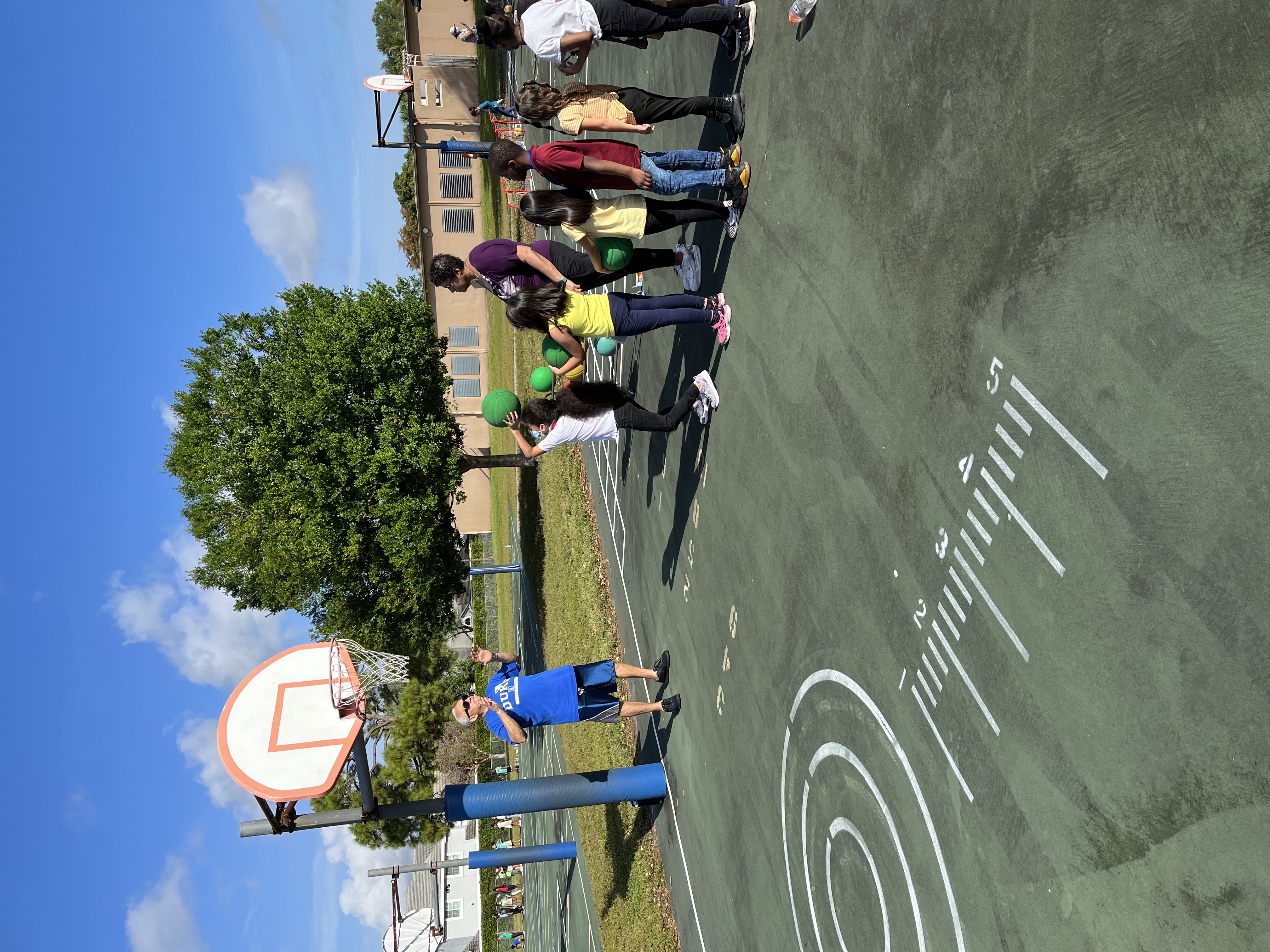 students line up for basketball challenge