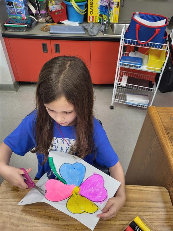 1st Graders making shamrocks