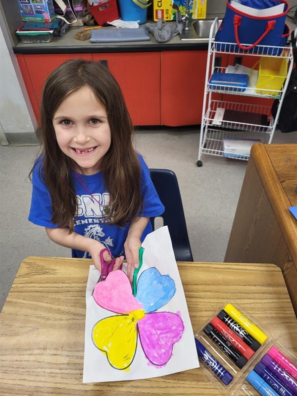 1st Graders making shamrocks