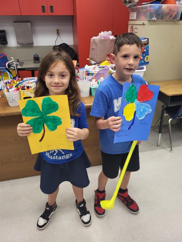 1st Graders making shamrocks